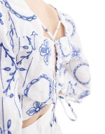 cropped embroidered woven top with tie back in white