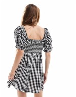 shirred mini dress in black gingham